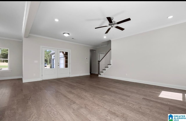 unfurnished living room with ceiling fan, ornamental molding, wood-type flooring, and french doors