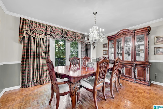 dining space featuring light parquet flooring, a notable chandelier, and ornamental molding