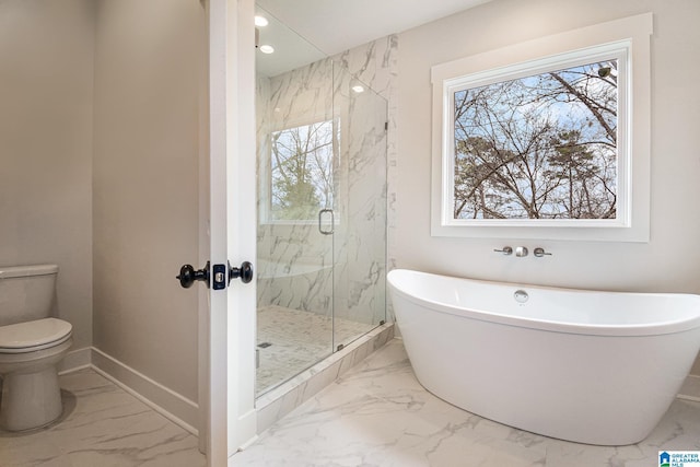 bathroom with toilet and separate shower and tub