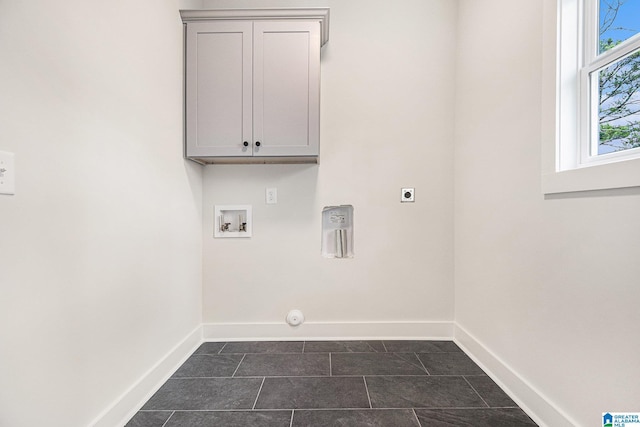 laundry area with cabinets, washer hookup, and hookup for an electric dryer