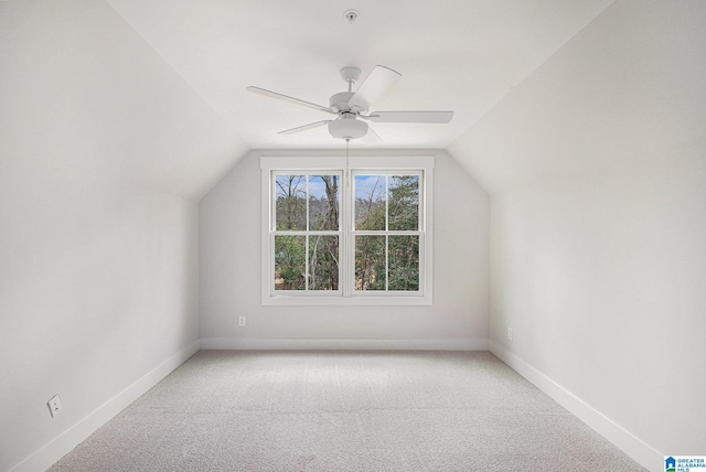 bonus room featuring ceiling fan, lofted ceiling, and carpet flooring