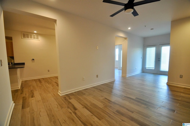 401 S 20th St Unit 420, Birmingham, AL 35233 - empty room with ceiling fan, wood-type flooring, and french doors