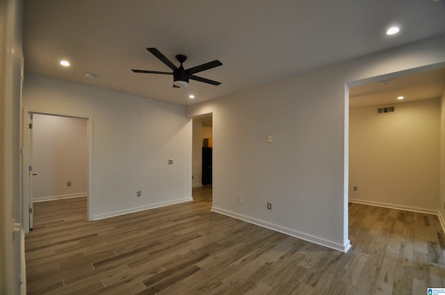 401 S 20th St Unit 420, Birmingham, AL 35233 - spare room featuring ceiling fan and dark wood-type flooring