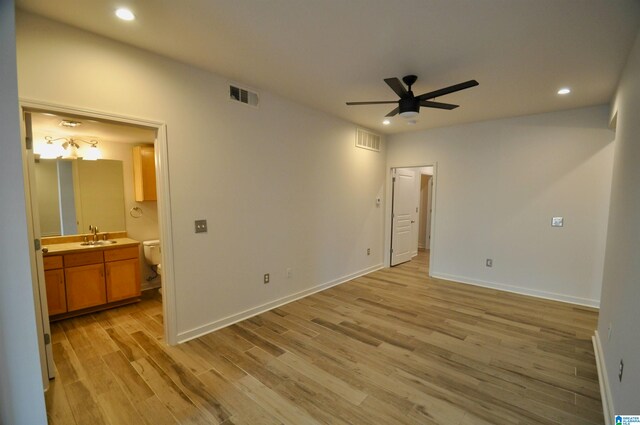 401 S 20th St Unit 420, Birmingham, AL 35233 - empty room with light hardwood / wood-style flooring, ceiling fan, and sink