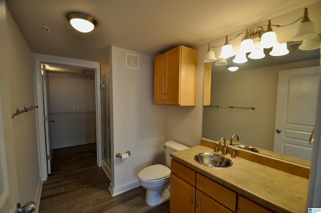 401 S 20th St Unit 420, Birmingham, AL 35233 - bathroom with hardwood / wood-style flooring, oversized vanity, and toilet