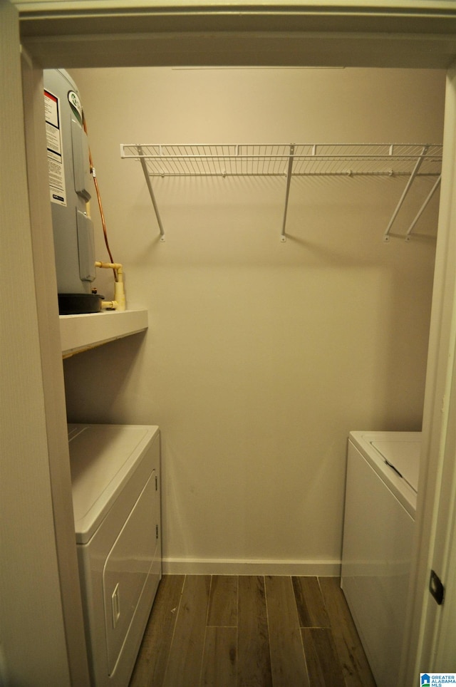 401 S 20th St Unit 420, Birmingham, AL 35233 - washroom with dark hardwood / wood-style flooring and separate washer and dryer