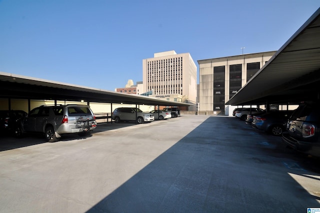 401 S 20th St Unit 420, Birmingham, AL 35233 - view of parking / parking lot with a carport