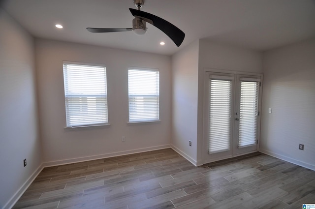 401 S 20th St Unit 420, Birmingham, AL 35233 - spare room with french doors, light hardwood / wood-style floors, and ceiling fan