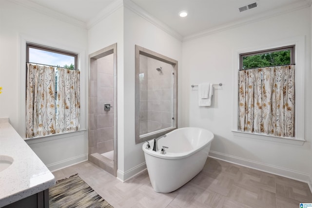 bathroom with vanity, a wealth of natural light, separate shower and tub, and crown molding