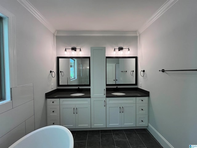 bathroom featuring vanity, tile patterned floors, and crown molding