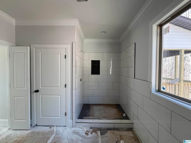 bathroom with walk in shower, tile walls, and ornamental molding