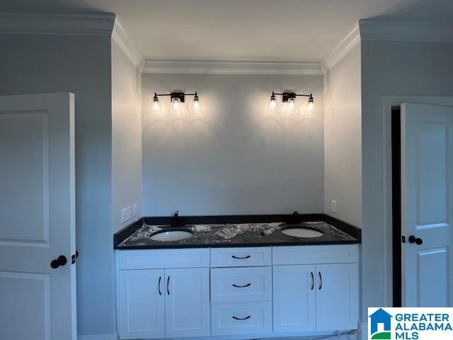 bathroom featuring vanity and crown molding