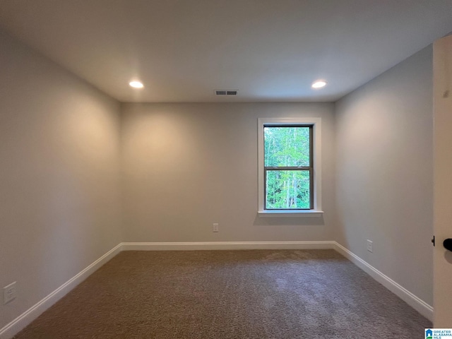 spare room with carpet floors