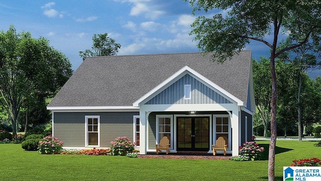 view of front of house featuring covered porch and a front lawn