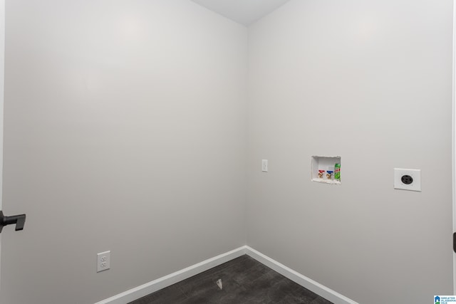 clothes washing area featuring hookup for a washing machine, hookup for an electric dryer, and hardwood / wood-style floors