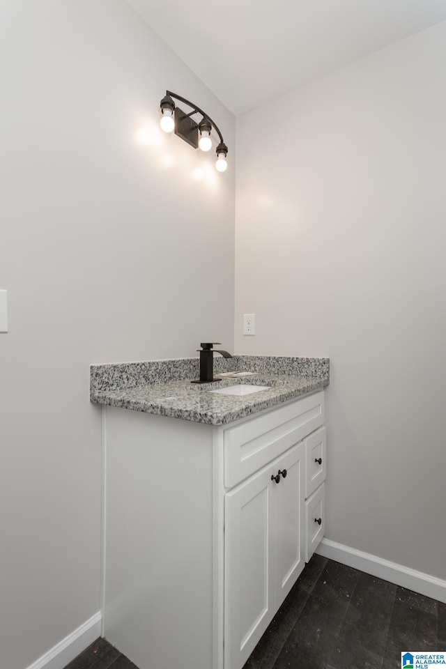 bathroom featuring vanity and tile patterned flooring