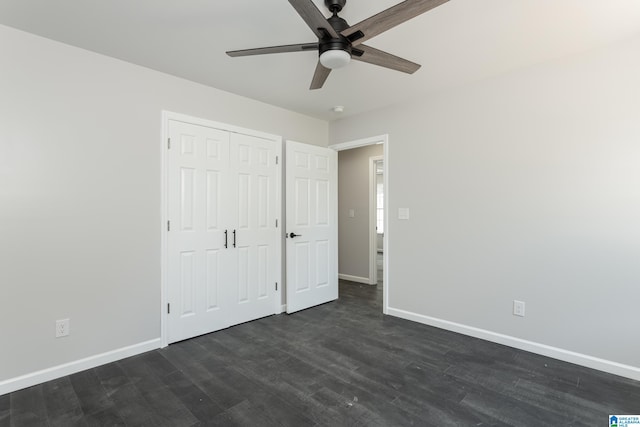 unfurnished bedroom featuring dark hardwood / wood-style flooring, a closet, and ceiling fan