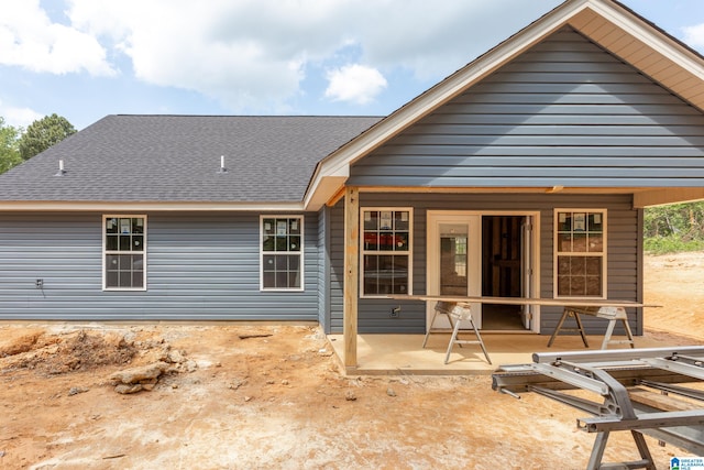 rear view of property with a patio area