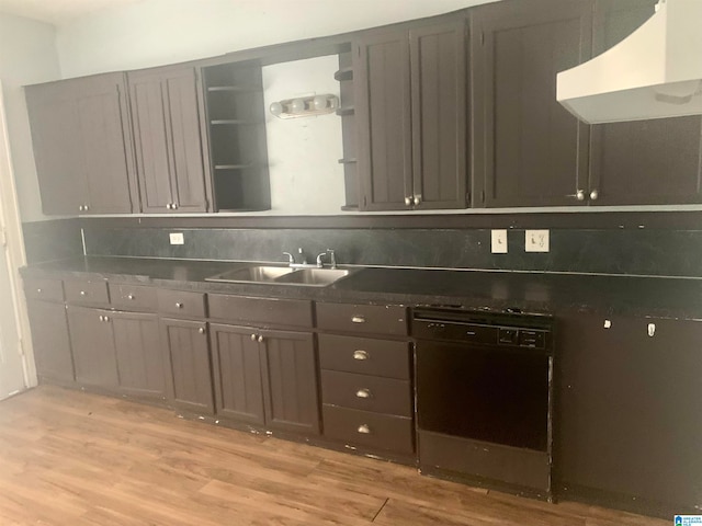 kitchen with sink, tasteful backsplash, light hardwood / wood-style floors, and dishwasher