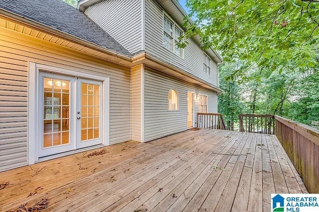 wooden deck featuring french doors