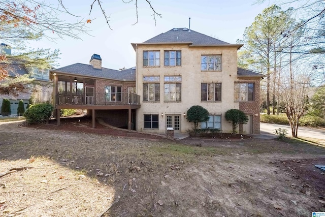 rear view of house with a deck