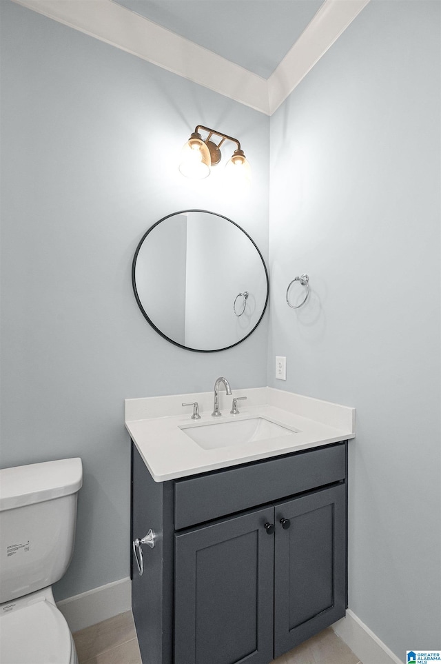 bathroom with vanity and toilet