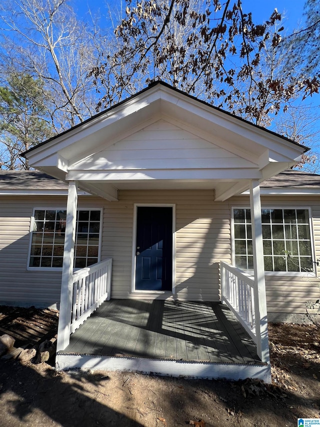 view of front of house with a wooden deck