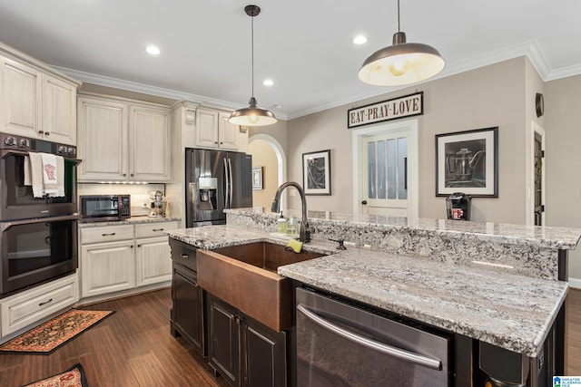 kitchen with a large island, stainless steel appliances, dark hardwood / wood-style floors, decorative light fixtures, and ornamental molding