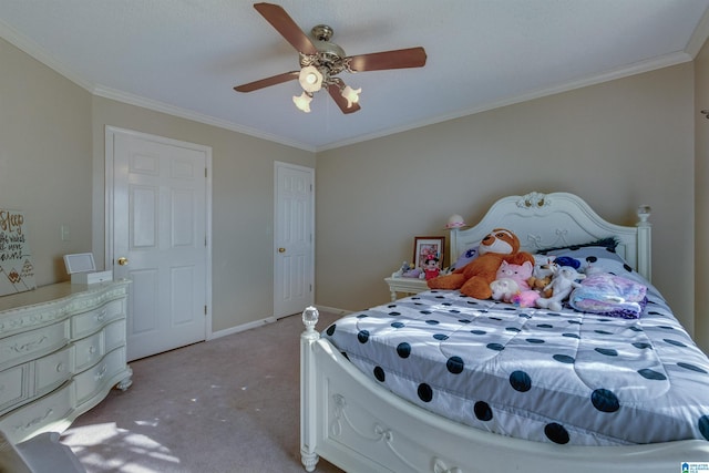 carpeted bedroom featuring ceiling fan and ornamental molding