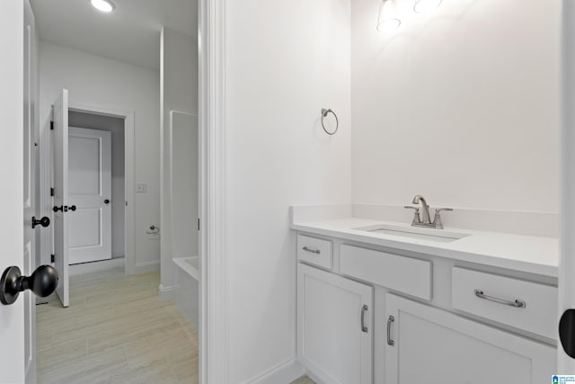 bathroom featuring vanity and tile flooring