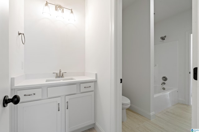 full bathroom with vanity, tile floors, toilet, and shower / tub combination