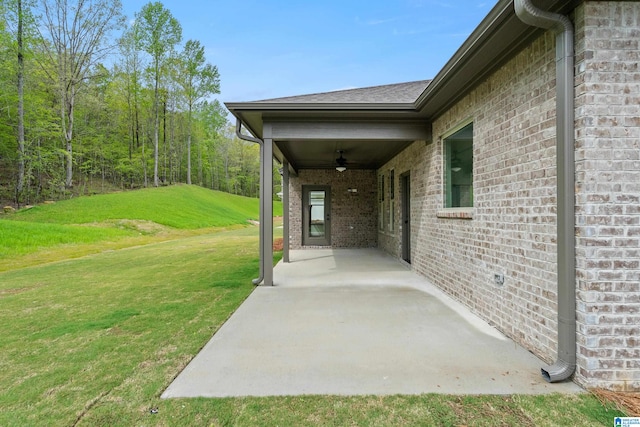 view of patio / terrace featuring ceiling fan