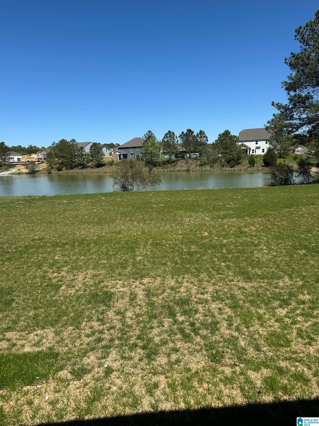 view of yard with a water view