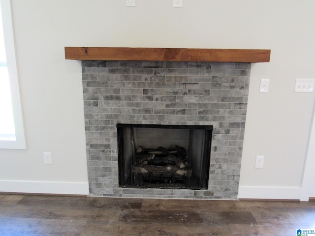 details with dark hardwood / wood-style flooring