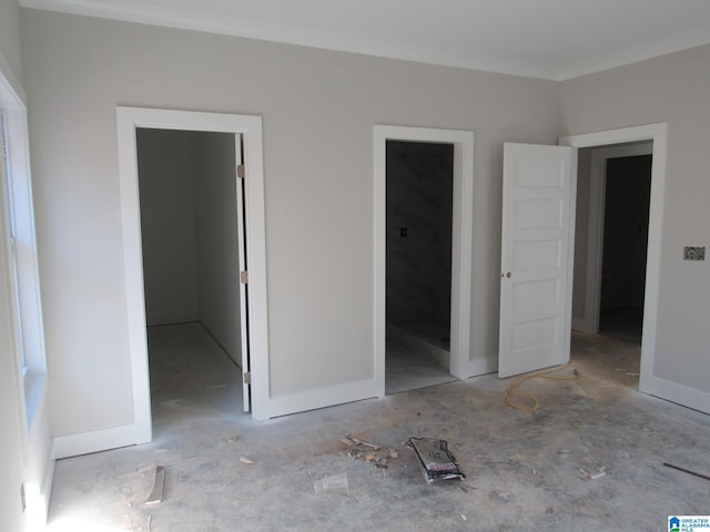 unfurnished room featuring ornamental molding