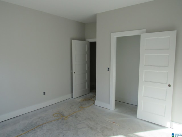 unfurnished bedroom featuring a closet