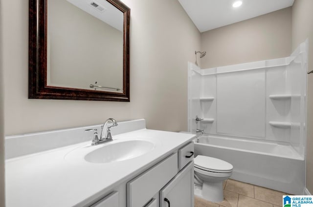 full bathroom featuring vanity, tile patterned floors, toilet, and shower / bath combination