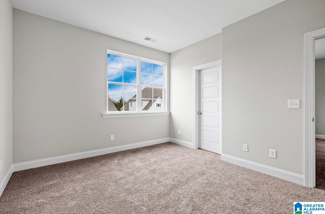 unfurnished bedroom with carpet flooring