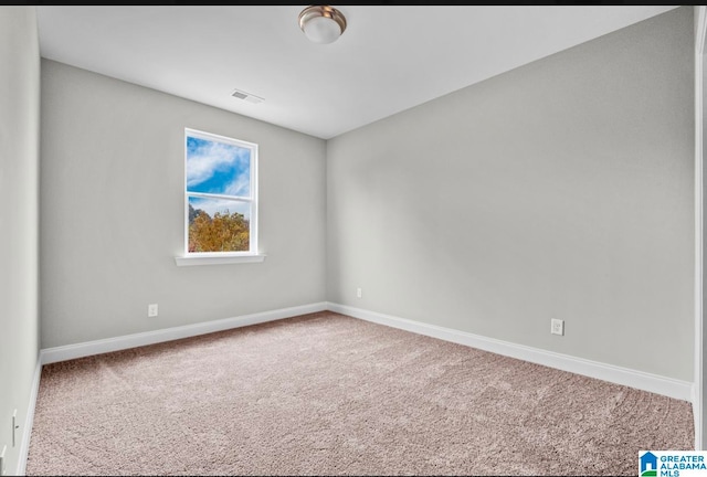 spare room with carpet flooring