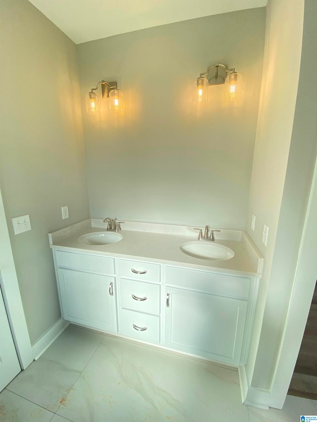 bathroom featuring dual bowl vanity and tile floors