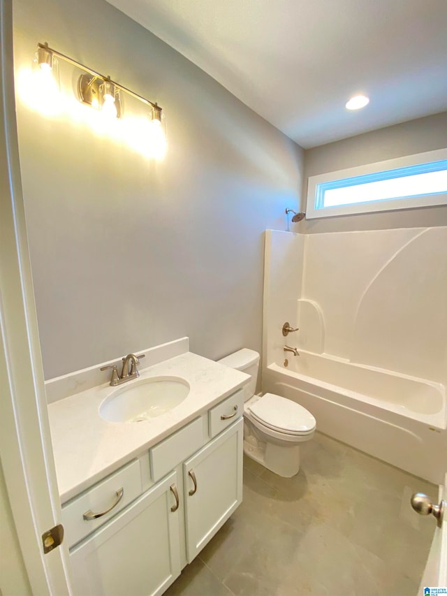 full bathroom featuring shower / bathtub combination, vanity, toilet, and tile floors