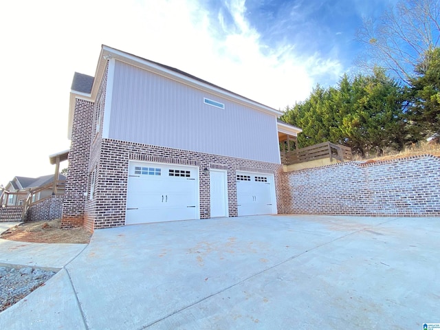 view of property exterior featuring a garage