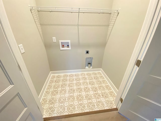 laundry area featuring tile flooring, washer hookup, and hookup for an electric dryer