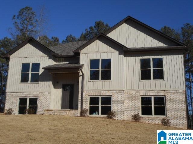 view of front of home with a front yard