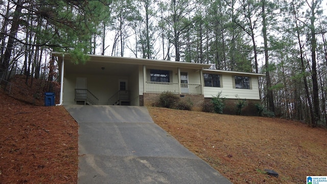 view of front of home with a carport