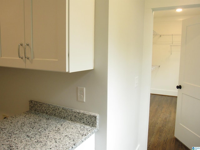 bathroom with wood-type flooring