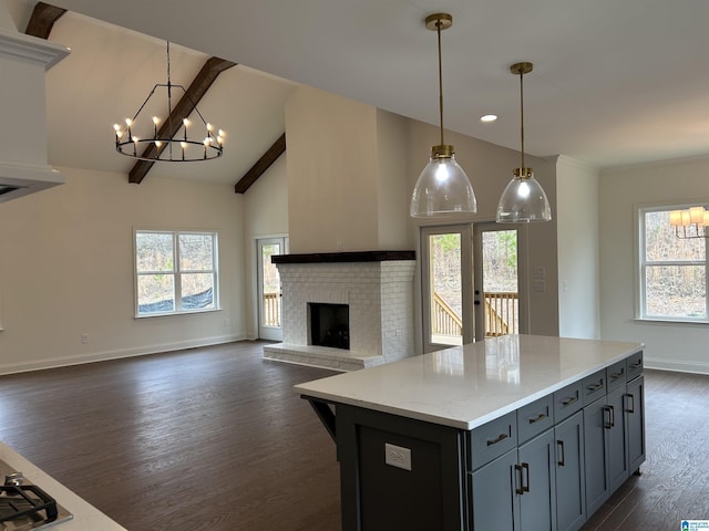 kitchen featuring a wealth of natural light and pendant lighting