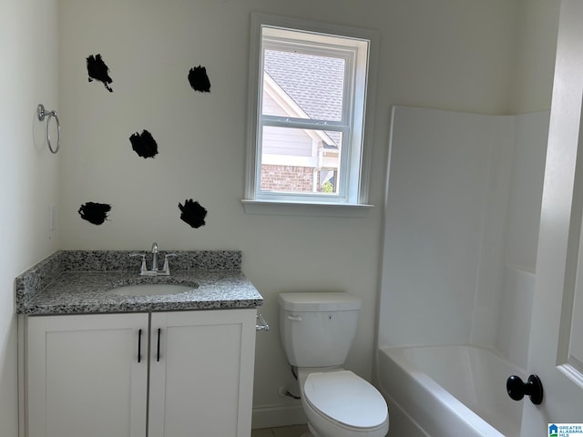 full bathroom with vanity,  shower combination, and toilet