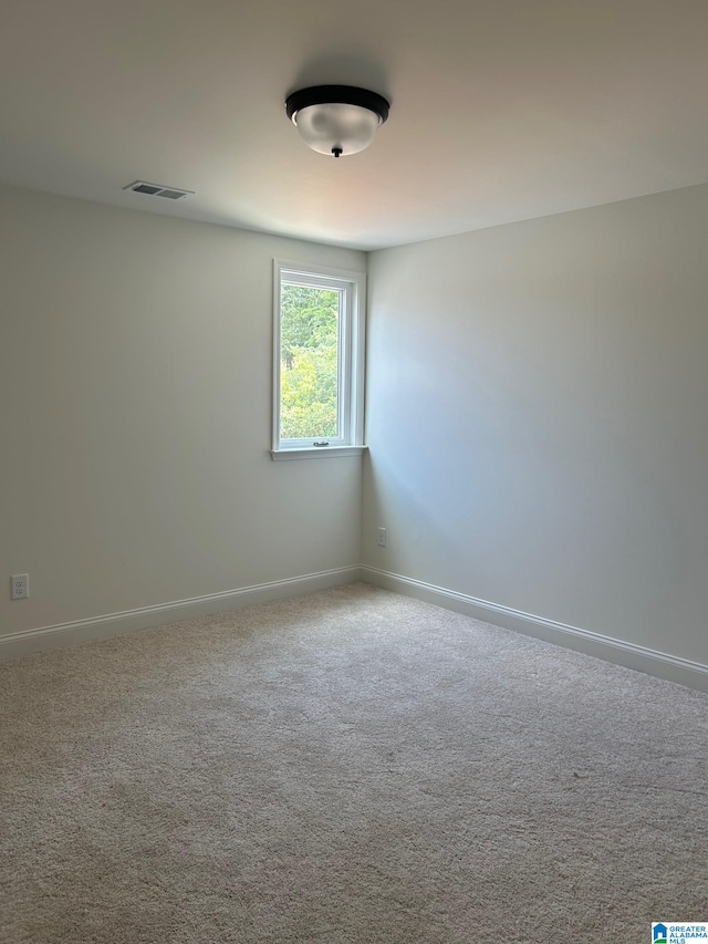 empty room featuring carpet