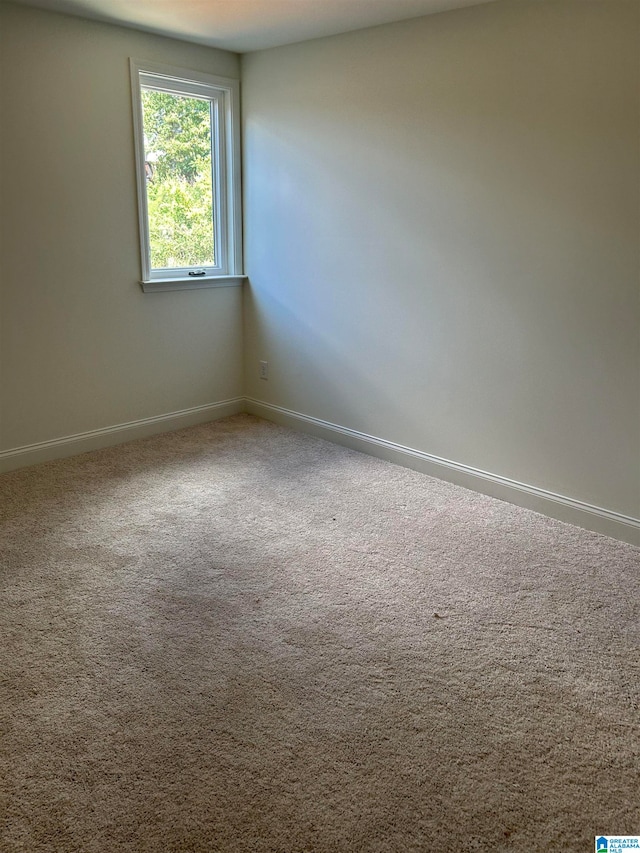 view of carpeted spare room